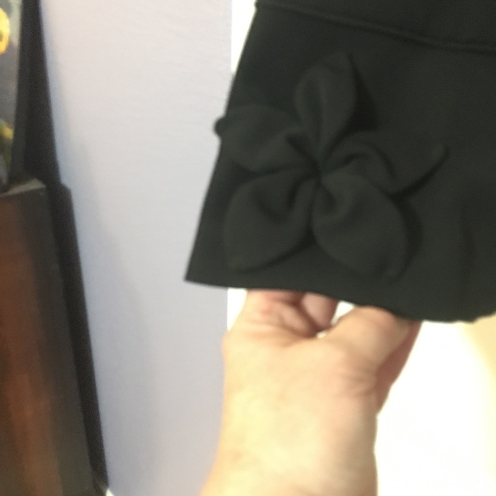 2/$15 Black A-line skirt with flowers at hem - Picture 2 of 13